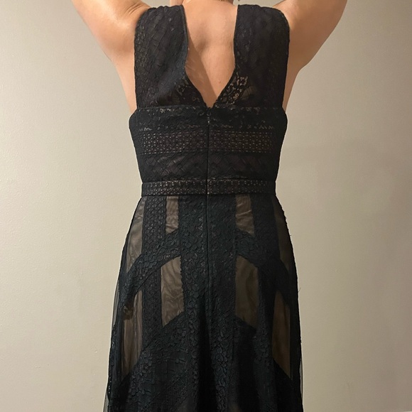 BCBGMAXAZRIA
Andi Asymmetrical Striped-Lace Dress Black Sleeveless - Picture 7 of 7